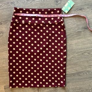 Rocksteady large maroon skirt with sand color polka dots.